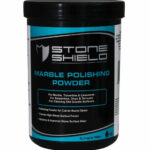 Image-of-a-black-and-blue-plastic-container-labeled-Stoneshield-Marble-Polishing-Powder-The-label-states-that-the-product-is-used-for-polishing-marble-travertine-limestone-serpentine-onyx-terrazzo-and-for-cleaning-old-granite-surfaces-Additional-text-on-the-label-highlights-that-the-powder-creates-a-high-gloss-finish-hardens-stone-surfaces-and-improves-wear-The-bottom-of-the-label-notes-that-1-litre-covers-up-to-100-square-meters